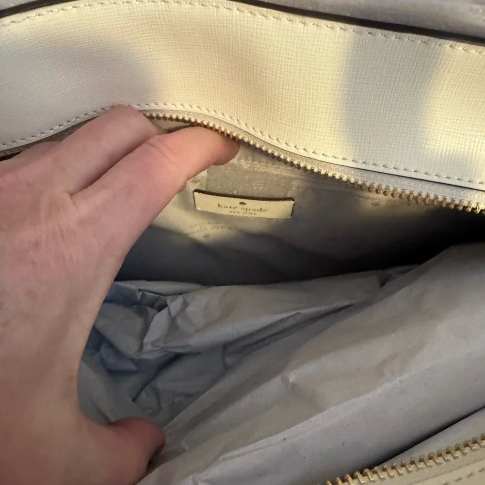 kate spade Cream Tote with Decorative Cutouts and Scarf Accent